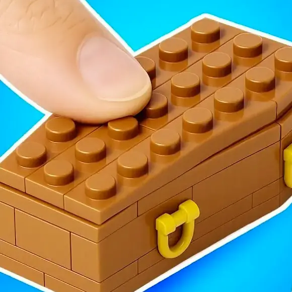 A finger pressing down on the lid of a little brown brick-built box with gold clasps
